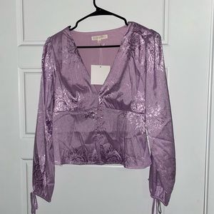 Purple women’s button up blouse